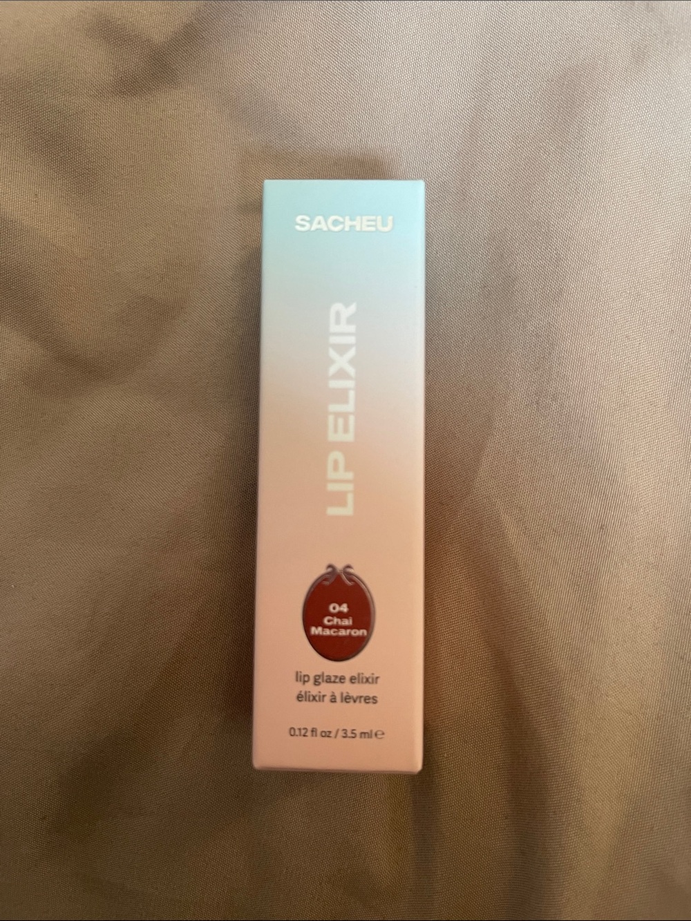 SACHEU Lip Elixir in Chai Macaron (04) - Sheer Brown Gloss